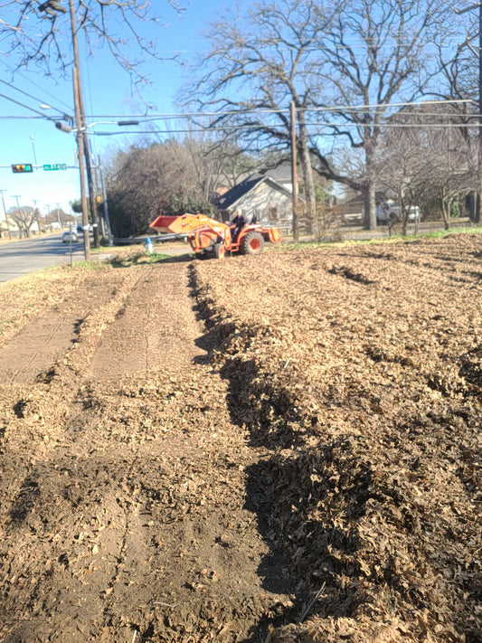 Garden Beds being Tilled by Kuboto Tractor